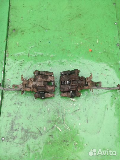 Задний тормозной суппорт nissan almera n16