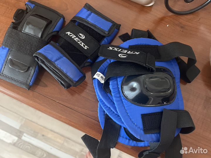 Роликовые коньки