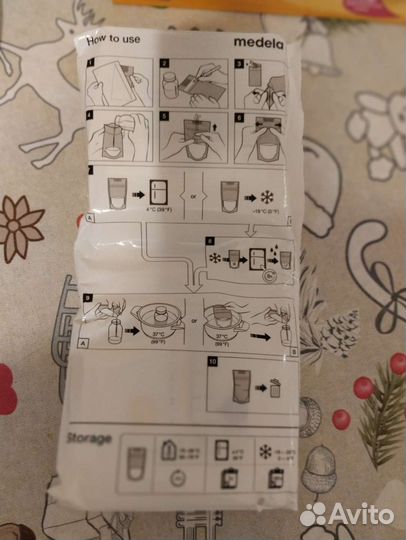 Молокоотсос ручной и пакеты для молока medela