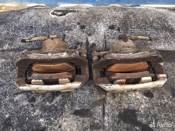 Суппорт тормозной передний Chevrolet Cruze