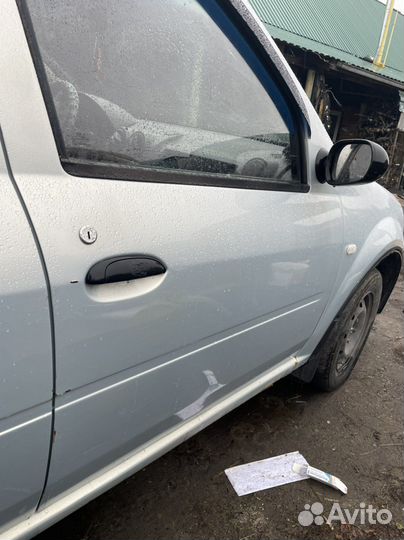 Дверь передняя правая 801001895R Renault Logan 1