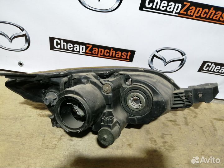 Фара левая Мазда 3 BK хэтчбек