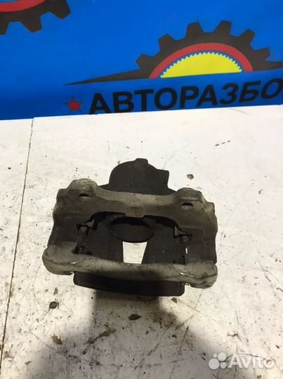 Суппорт передний правый Opel Corsa