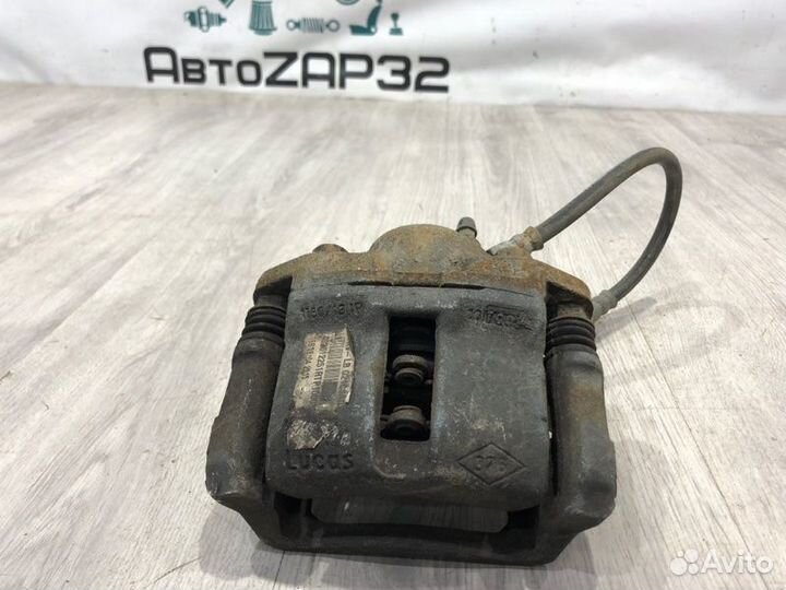 Суппорт тормозной передний левый Renault Logan