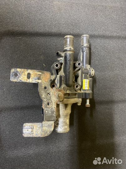 Корпус термостата Chevrolet Aveo T300 F16D4