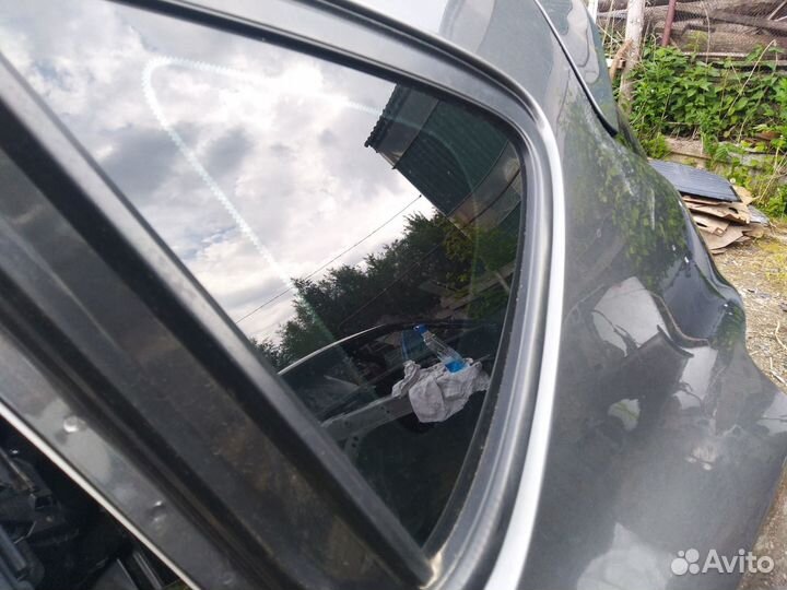 Стекло кузовное заднее левое Opel Astra J хэтчбек
