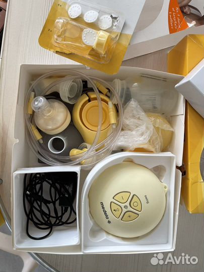 Молокоотсос medela