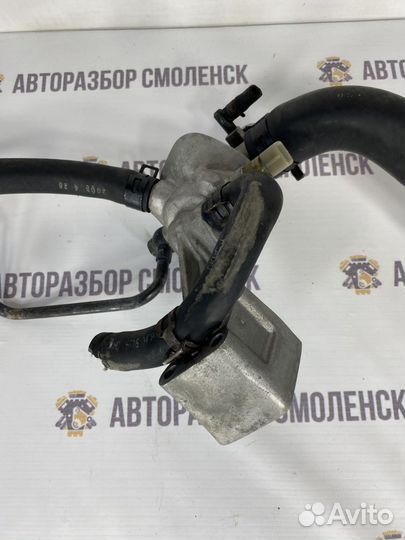 Корпус термостата Kia Carnival J3