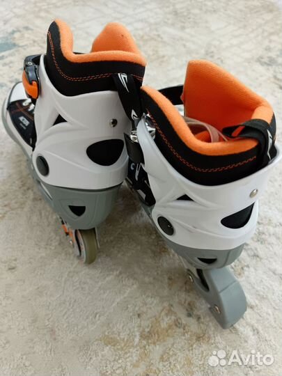 Роликовые коньки