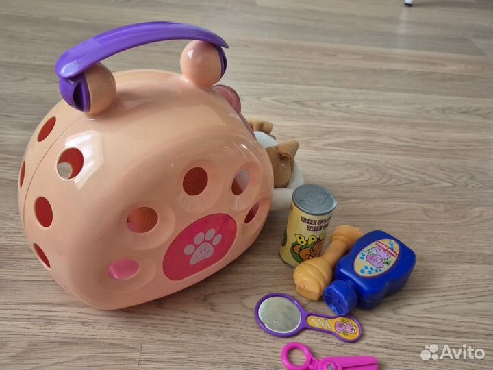 Игрушка собачка в контейнере