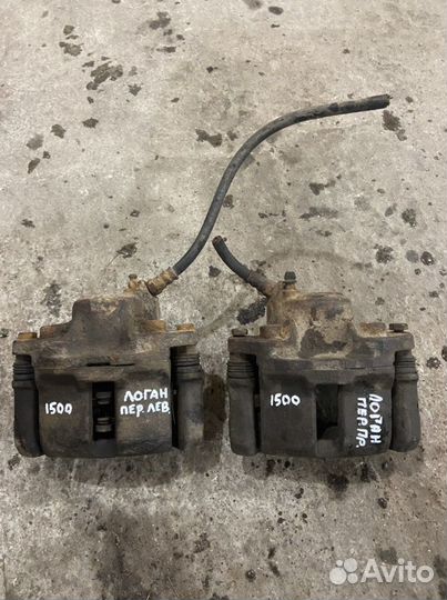 Суппорт в сборе передний Рено Логан