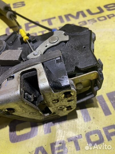 Замок передней левой двери Toyota Corolla E120