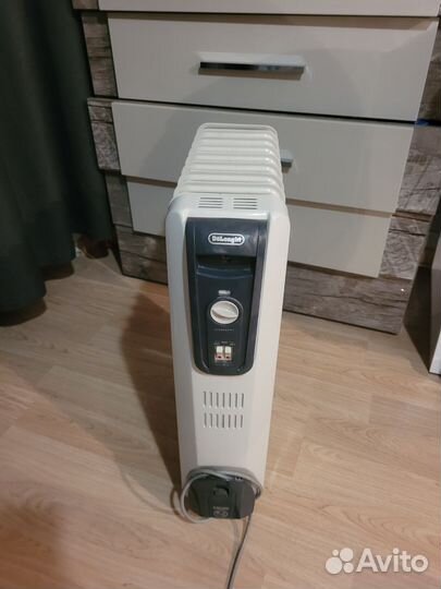 Масляный обогреватель delonghi 2000w
