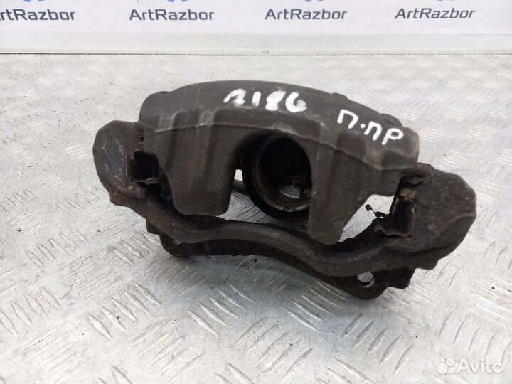 Суппорт передний правый Toyota Avensis T250 1.6