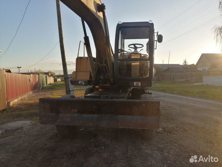 Колёсный экскаватор Твэкс ЕК-12-10, 2003