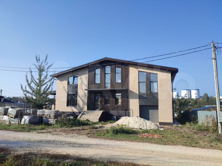 Коттедж 380 м² на участке 9 сот.