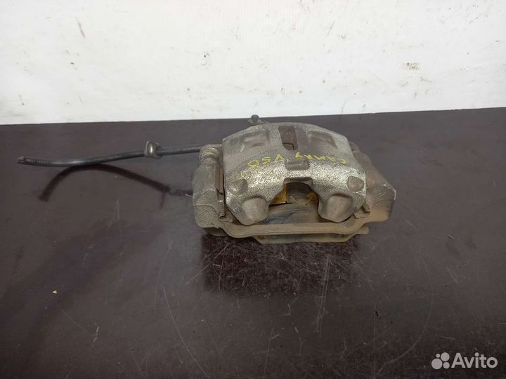 Суппорт передний правый Тойота Камри