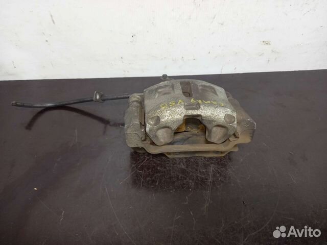 Суппорт передний правый Тойота Камри