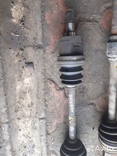 Полуось (привод) передний левый Hyundai Accent