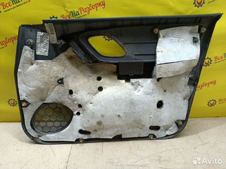 Обшивка боковой двери передняя левая Ford Maverick