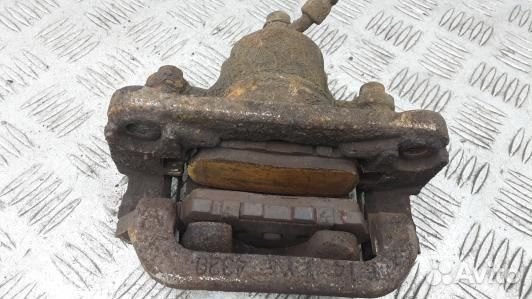 Суппорт тормозной задний левый suzuki grand vitara