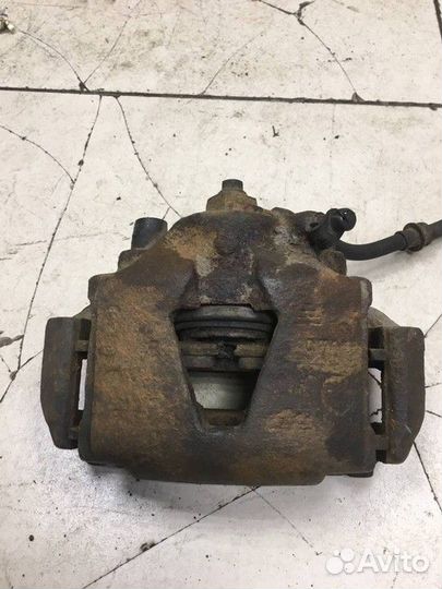 Суппорт тормозной передний левый Opel Vectra