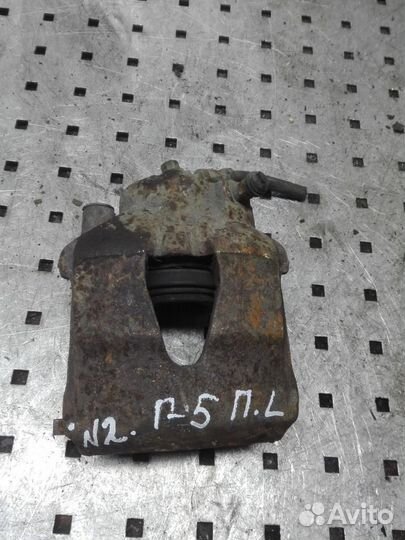 Суппорт передний левый Volkswagen Golf