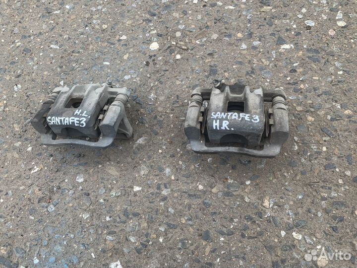 Суппорт задний левый правый Hyundai Santa Fe 1