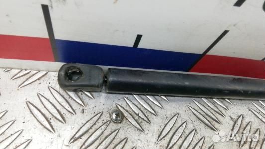 Амортизатор капота opel antara (GNT18D701)