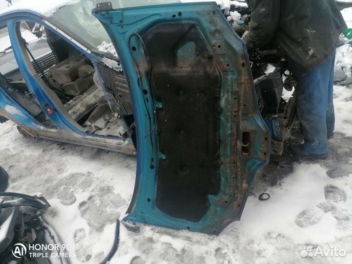 Капот nissan almera tino