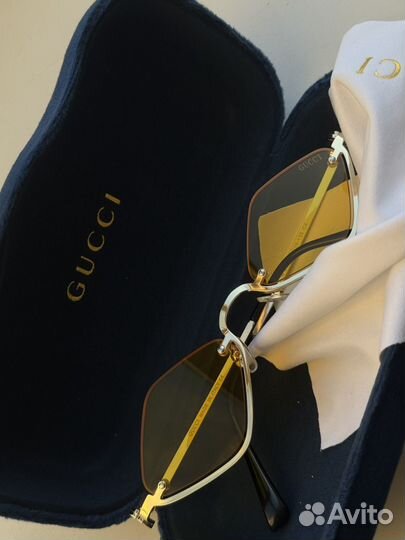 Солнцезащитные очки Gucci
