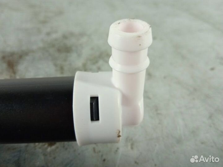 Форсунка омывателя фары правая Honda Civic 8 4D