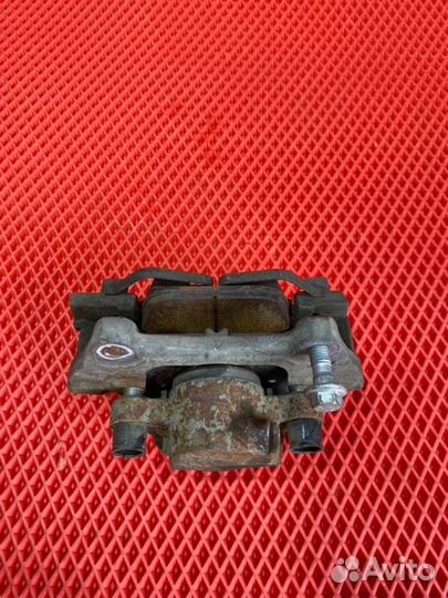 Суппорт тормозной передний левый Volvo Xc90 2 L