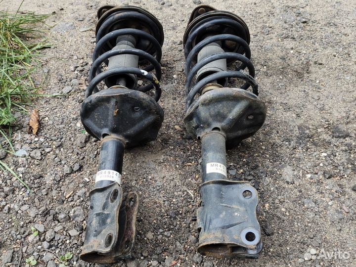 Стойки передние Митсубиси Лансер 9