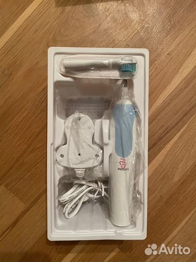 Электрическая зубная щетка philips новая