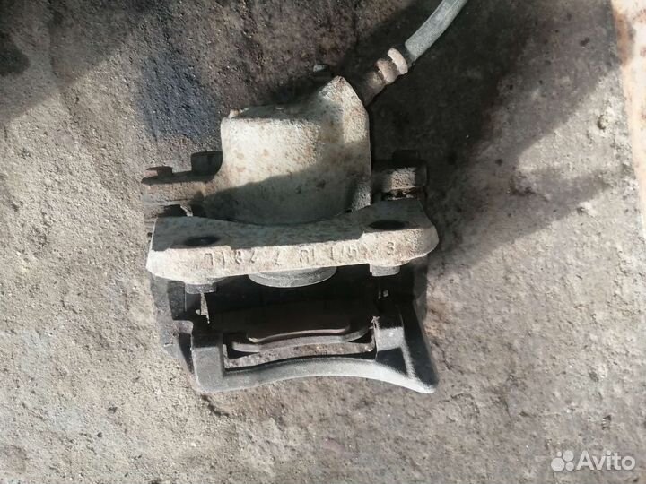 Суппорт тормозной Renault Logan 1