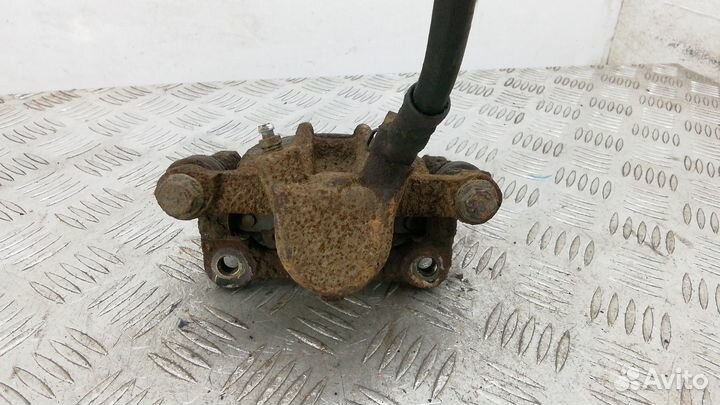 Суппорт задний левый Toyota Corolla