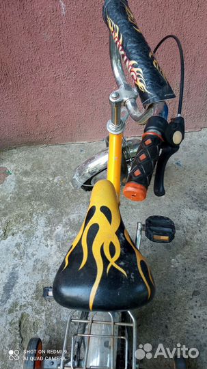 Детский велосипед с приставными колесами