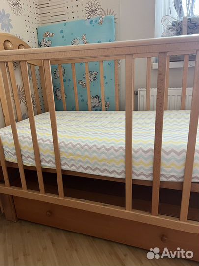 Детская кроватка с маятником Лель