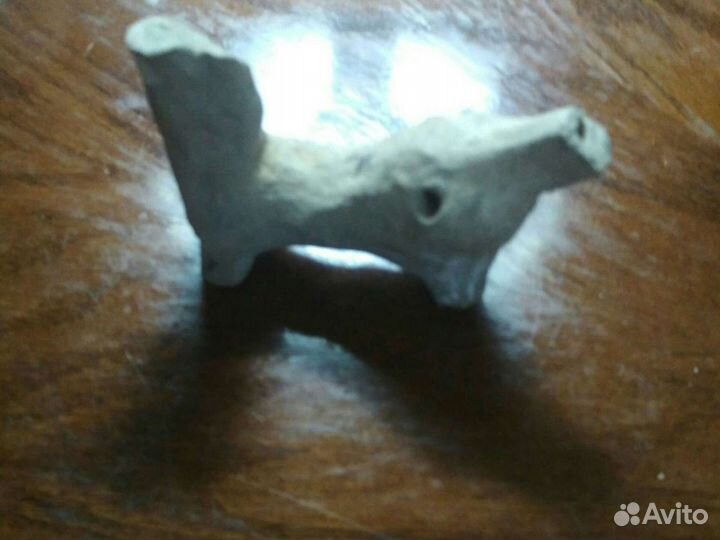 Древняя свистулька из глины