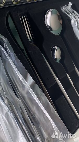 Набор столовых приборов новый в коробке 24предм