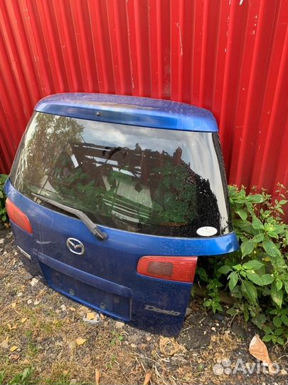 Дверь багажника Mazda Demio