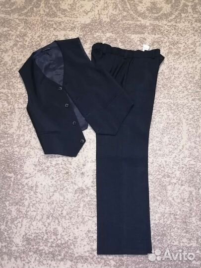 Школьные брюки и жилетка 134