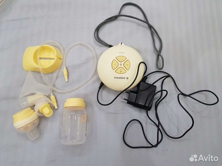 Молокоотсос medela электрический