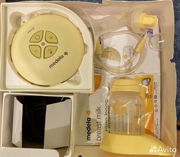 Молокоотсос medela электрический