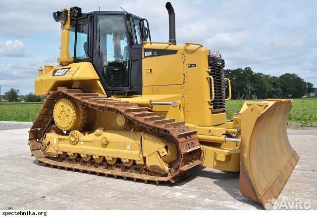 Машинист бульдозера CAT