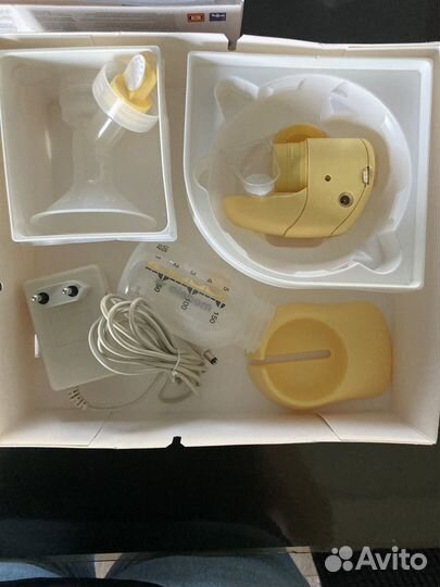 Молокоотсос medela электрический