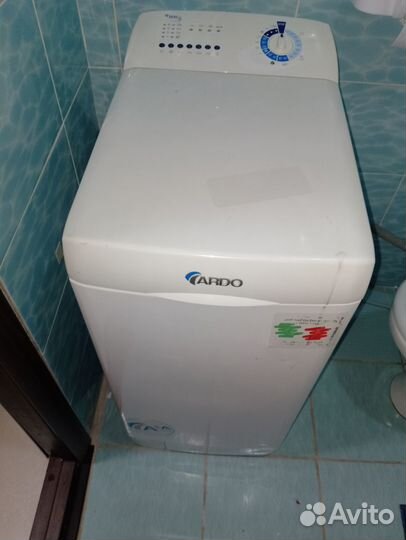 Стиральная машина с вертикальной загрузкой