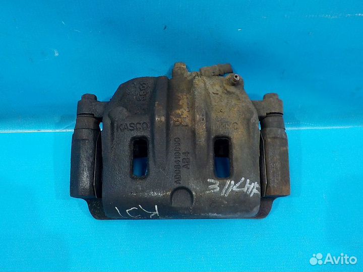 Тормозной суппорт передний левый KIA Sorento 1 200