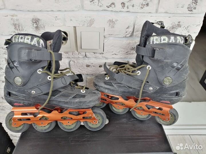 Роликовые коньки